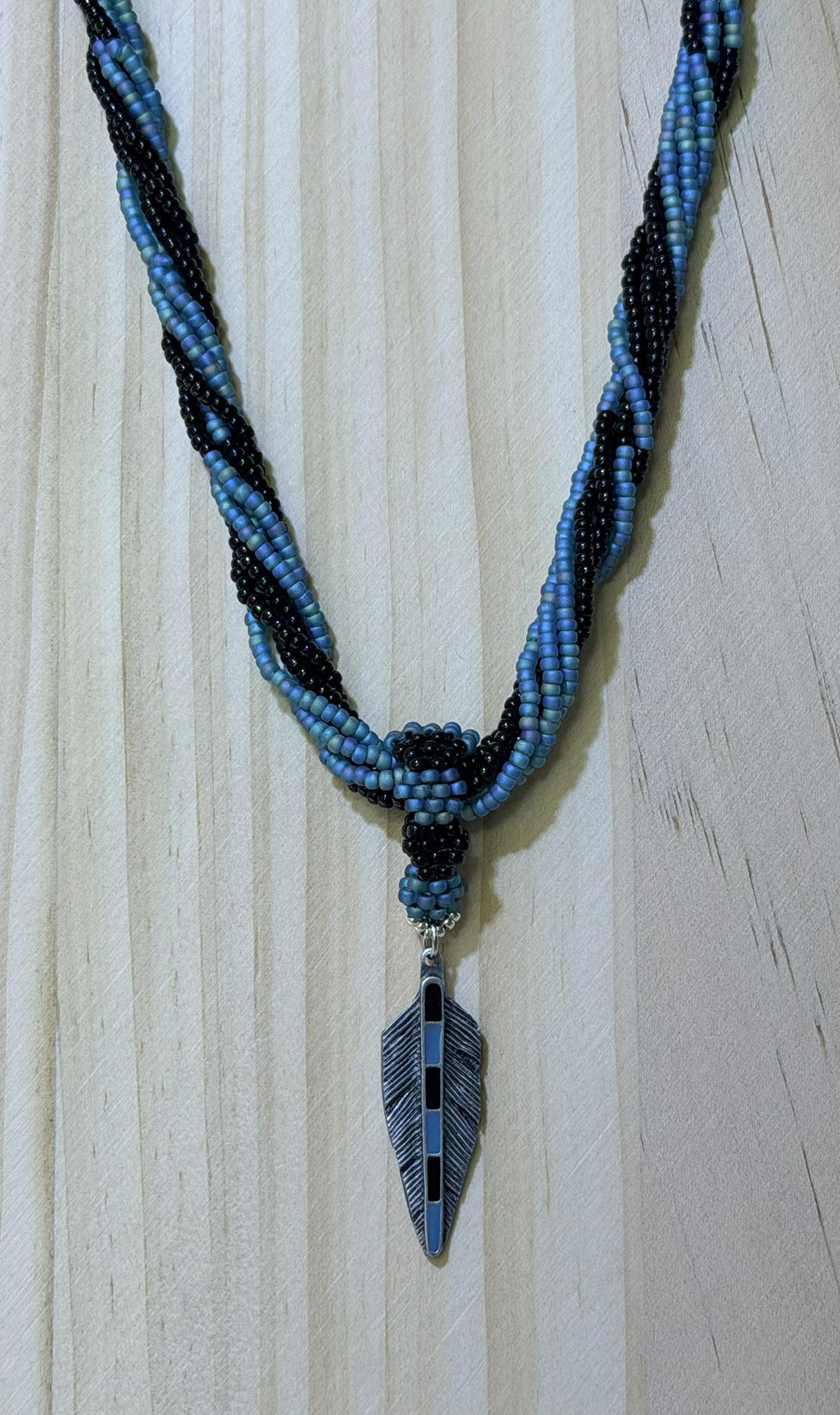 Seed Bead Spun Necklace with Feather pendant